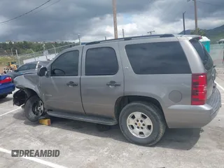 2007 Chevrolet Tahoe LT z VIN 1GNFC13J07J122414, wystawiony jako IAAI lot #39134539 z przebiegiem Nie podano mil oraz . Historia ofert i sprzedaży dostępna na DreamBid. Obrazek 13.
