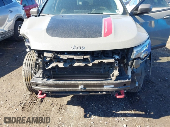 2022 Jeep Compass Trailhawk with VIN 3C4NJDDB4NT136213, listed as a IAAI auction lot 41689612 with 50,091 mi miles and . Bid and sale history available at DreamBid. Image 6.