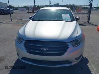 2013 Ford Taurus SEL with VIN 1FAHP2E81DG129229, listed as a IAAI auction lot 41999326 with 205,856 mi miles. Bid and sale history available at carsss.com. Image 6.