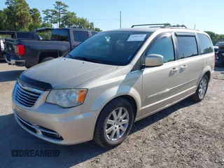 2014 Chrysler Town & Country Touring with VIN 2C4RC1BG4ER372629, listed as a IAAI auction lot 42060762 with 180,662 mi miles. Bid and sale history available at carsss.com. Image 17.