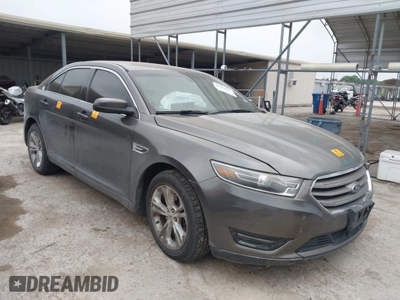 2015 Ford Taurus SEL z VIN 1FAHP2E85FG209085, wystawiony jako IAAI lot #41944532 z przebiegiem 143 850 mil mil oraz . Historia ofert i sprzedaży dostępna na DreamBid. Obrazek 1.