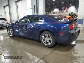2014 Dodge Charger RT with VIN 2C3CDXDT1EH303682, listed as a Copart auction lot 69005454 with 70,407 mi miles and Salvage Title. Bid and sale history available at carsss.com. Image 2.