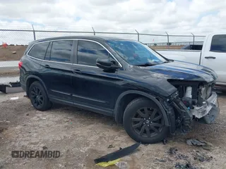 2020 Honda Pilot EX-L z VIN 5FNYF6H56LB067390, wystawiony jako IAAI lot #42190468 z przebiegiem 74 714 mil mil oraz . Historia ofert i sprzedaży dostępna na DreamBid. Obrazek 1.