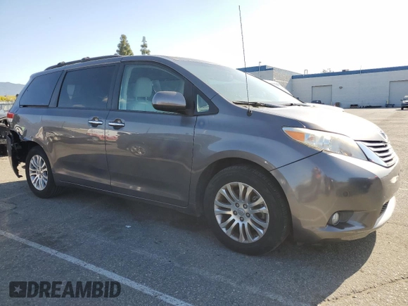2013 Toyota Sienna XLE AAS with VIN 5TDYK3DC8DS323329, listed as a Copart auction lot 51957005 with 157,638 mi miles and Salvage title. Bid and sale history available at DreamBid. Image 4.