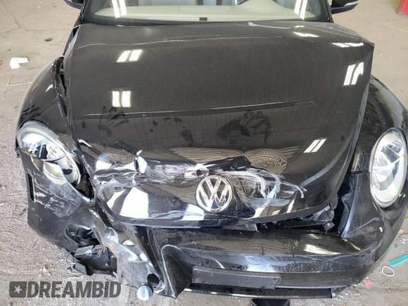 2013 Volkswagen Beetle 2.5L с VIN 3VW5P7AT5DM811974, выставлен на аукционе Copart как лот 56853015 с пробегом 68 959 миль миль и На запчасти • Non repairable. История ставок и продаж доступна на DreamBid. Изображение 11.
