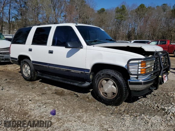 1997 GMC Yukon with VIN 1GKEK13R0VJ747359, listed as a Copart auction lot 48301095 with 272,417 mi miles and Salvage Title. Bid and sale history available at carsss.com. Image 4.