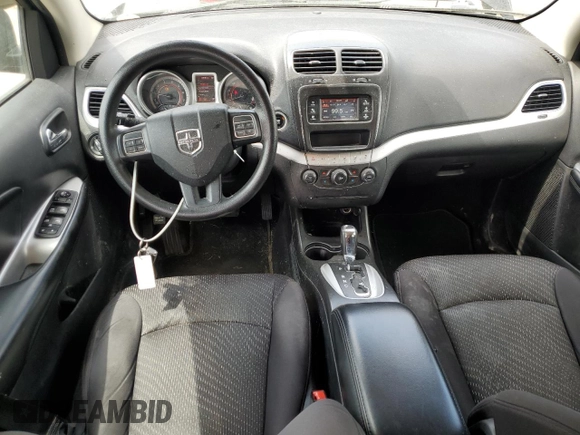 2014 Dodge Journey SXT z VIN 3C4PDCBG8ET115115, wystawiony jako Copart lot #56632555 z przebiegiem 139 785 mil mil oraz Szkoda całkowita • Salvage title. Historia ofert i sprzedaży dostępna na DreamBid. Obrazek 8.