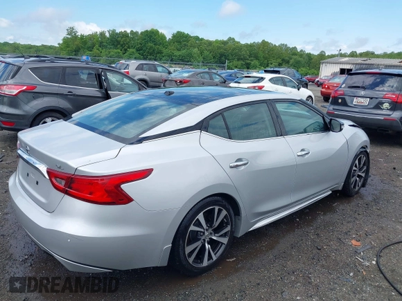 2016 Nissan Maxima SV with VIN 1N4AA6AP5GC900892, listed as a IAAI auction lot 42139043 with 325,228 mi miles and . Bid and sale history available at DreamBid. Image 4.