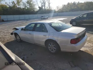 2000 Cadillac Seville Touring STS z VIN 1G6KY5497YU345038, wystawiony jako Copart lot #74315354 z przebiegiem 96 704 mil mil oraz Nie do naprawy • Non repairable. Historia ofert i sprzedaży dostępna na DreamBid. Obrazek 2.