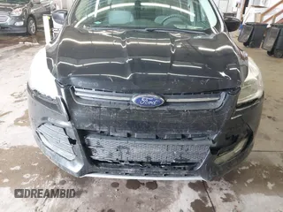 2014 Ford Escape SE with VIN 1FMCU0GX4EUC50972, listed as a IAAI auction lot 41953559 with 134,936 mi miles. Bid and sale history available at carsss.com. Image 6.