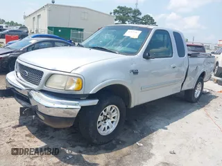 2000 Ford F-150 XL with VIN 1FTRX18L1YNA13975, listed as a IAAI auction lot 42397187 with 235,471 mi miles and . Bid and sale history available at DreamBid. Image 17.