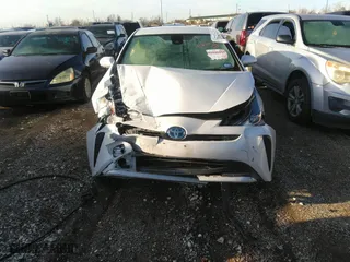 2022 Toyota Prius L Eco with VIN JTDKAMFU5N3156063, listed as a IAAI auction lot 41214358 with 208,666 mi miles. Bid and sale history available at carsss.com. Image 13.
