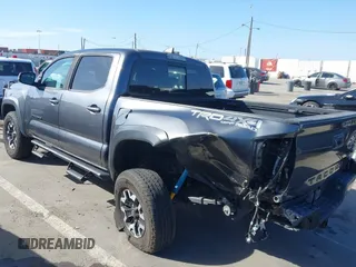 2020 Toyota Tacoma SR5 with VIN 3TMCZ5AN2LM351472, listed as a IAAI auction lot 41621286 with 48,402 mi miles and . Bid and sale history available at DreamBid. Image 3.