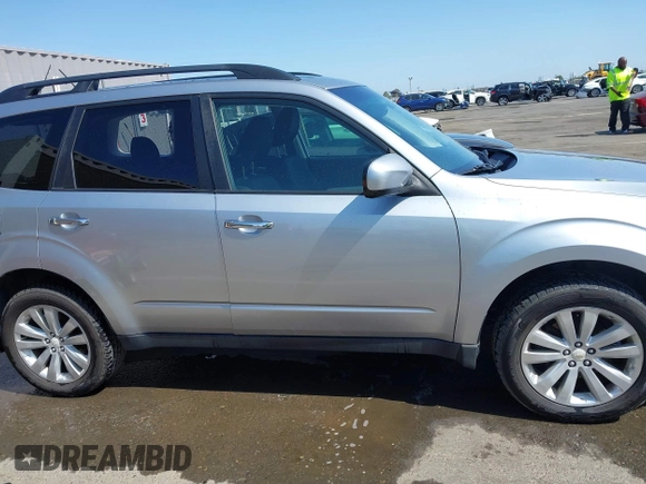 2012 Subaru Forester X Premium with VIN JF2SHADC9CH403834, listed as a IAAI auction lot 42477876 with 193,064 mi miles and . Bid and sale history available at DreamBid. Image 13.