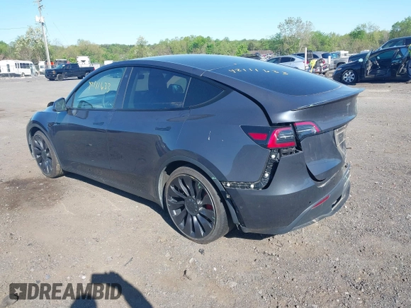 2022 Tesla Model Y Performance with VIN 7SAYGDEF9NF326944, listed as a IAAI auction lot 42111633 with Not Provided miles and . Bid and sale history available at DreamBid. Image 3.