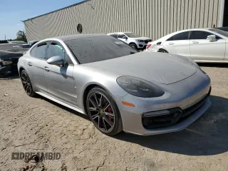 2020 Porsche Panamera GTS с VIN WP0AG2A71LL145610, выставлен на аукционе Copart как лот 77422124 с пробегом Не указан миль и Списание • Salvage title. История ставок и продаж доступна на DreamBid. Изображение 4.