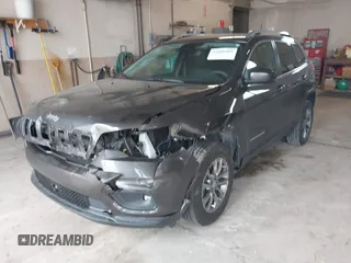 2020 Jeep Cherokee Altitude z VIN 1C4PJMLX9LD644816, wystawiony jako IAAI lot #42400461 z przebiegiem 32 235 mil mil oraz . Historia ofert i sprzedaży dostępna na DreamBid. Obrazek 6.