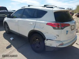 2017 Toyota RAV4 LE with VIN JTMZFREV0HJ116626, listed as a IAAI auction lot 41809294 with 110,114 mi miles. Bid and sale history available at carsss.com. Image 3.