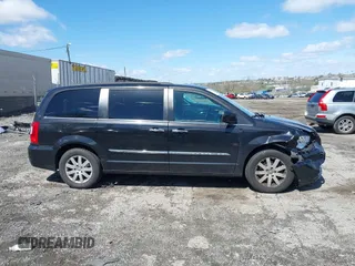 2015 Chrysler Town & Country Touring with VIN 2C4RC1BG5FR521339, listed as a IAAI auction lot 41984089 with 107,275 mi miles and . Bid and sale history available at DreamBid. Image 13.