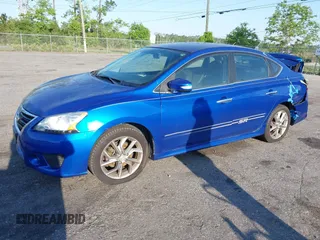 2015 Nissan Sentra S with VIN 3N1AB7AP9FY266606, listed as a IAAI auction lot 41983060 with 105,317 mi miles. Bid and sale history available at carsss.com. Image 2.