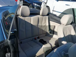 2015 BMW 2 Series 228i with VIN WBA1K5C57FV473826, listed as a IAAI auction lot 41866820 with 130,823 mi miles. Bid and sale history available at carsss.com. Image 8.