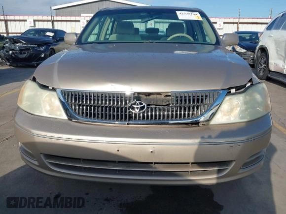 2001 Toyota Avalon XL z VIN 4T1BF28B31U185174, wystawiony jako IAAI lot #42338204 z przebiegiem 298 540 mil mil oraz . Historia ofert i sprzedaży dostępna na DreamBid. Obrazek 6.