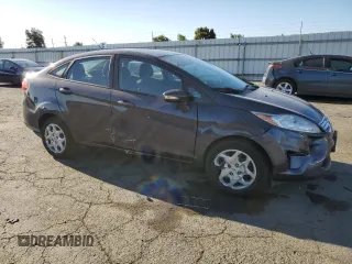 2013 Ford Fiesta SE z VIN 3FADP4BJ9DM186382, wystawiony jako Copart lot #67754934 z przebiegiem 157 495 mil mil oraz Szkoda całkowita • Salvage title. Historia ofert i sprzedaży dostępna na DreamBid. Obrazek 4.