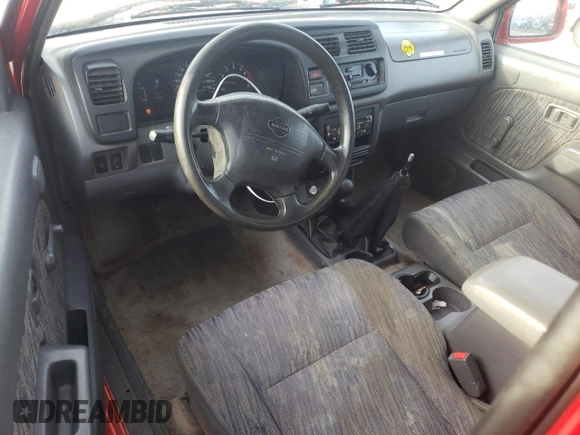 1999 Nissan Frontier XE with VIN 1N6ED26Y2XC312863, listed as a Copart auction lot 42259015 with 212,666 mi miles and Salvage title. Bid and sale history available at DreamBid. Image 8.