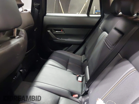 2023 Mazda CX-50 S Premium Plus with VIN 7MMVABEM3PN108555, listed as a IAAI auction lot 41202257 with 21,258 mi miles and . Bid and sale history available at DreamBid. Image 8.