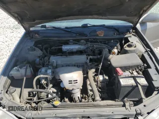 2000 Toyota Camry CE z VIN 4T1BG22K3YU009533, wystawiony jako Copart lot #48996855 z przebiegiem 132 705 mil mil oraz Szkoda całkowita • Salvage title. Historia ofert i sprzedaży dostępna na DreamBid. Obrazek 13.