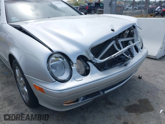 2002 Mercedes-Benz CLK 320/430 with VIN WDBLJ65G52T126485, listed as a IAAI auction lot 41978394 with 141,315 mi miles and . Bid and sale history available at DreamBid. Image 12.