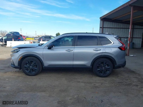 2023 Honda CR-V Hybrid Sport Touring with VIN 7FARS6H95PE004133, listed as a IAAI auction lot 41241806 with 82,427 mi miles. Bid and sale history available at carsss.com. Image 14.