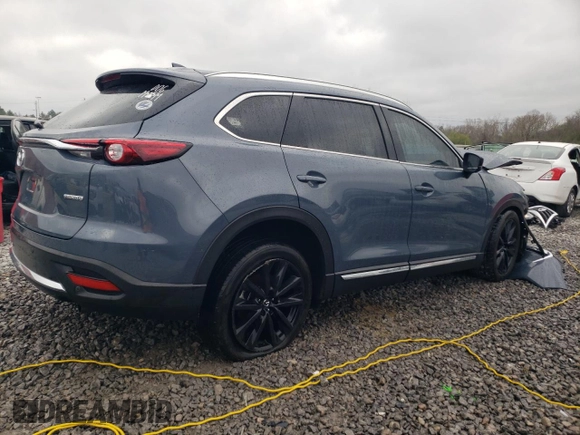 2023 Mazda CX-9 Carbon Edition with VIN JM3TCBDY8P0649319, listed as a Copart auction lot 47799745 with 56,865 mi miles and Salvage Title. Bid and sale history available at carsss.com. Image 3.