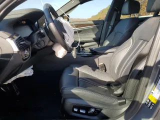2023 BMW 5 Series M550i xDrive with VIN WBA13BK09PCN61839, listed as a Copart auction lot 76614694 with 16,279 mi miles and Salvage title. Bid and sale history available at DreamBid. Image 7.