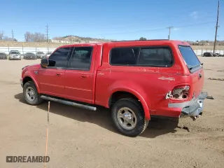 2001 Ford F-150 SuperCrew XLT with VIN 1FTRW08L41KE05465, listed as a Copart auction lot 46956725 with 276,256 mi miles and Salvage Title. Bid and sale history available at carsss.com. Image 2.