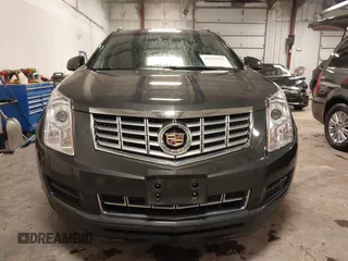 2014 Cadillac SRX with VIN 3GYFNAE34ES665630, listed as a IAAI auction lot 41315281 with 99,009 mi miles and . Bid and sale history available at DreamBid. Image 12.