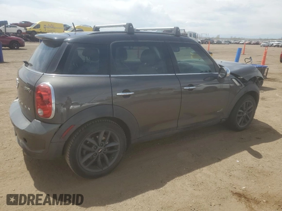 2013 MINI Countryman S ALL4 z VIN WMWZC5C56DWM16203, wystawiony jako Copart lot #54346425 z przebiegiem 148 065 mil mil oraz Szkoda całkowita • Salvage title. Historia ofert i sprzedaży dostępna na DreamBid. Obrazek 3.