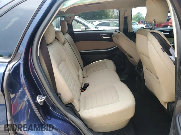 2017 Ford Edge SE z VIN 2FMPK3G90HBC58801, wystawiony jako Copart lot #64874245 z przebiegiem 68 803 mil mil oraz Szkoda całkowita • Salvage title. Historia ofert i sprzedaży dostępna na DreamBid. Obrazek 11.