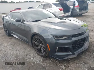 2023 Chevrolet Camaro ZL1 z VIN 1G1FK1R60P0102922, wystawiony jako IAAI lot #40429422 z przebiegiem 49 272 mil mil oraz . Historia ofert i sprzedaży dostępna na DreamBid. Obrazek 1.