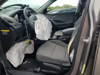 2018 Hyundai Santa Fe 2.4L z VIN 5NMZT3LB2JH104519, wystawiony jako Copart lot #60915715 z przebiegiem Nie podano mil oraz Szkoda całkowita • Salvage title. Historia ofert i sprzedaży dostępna na DreamBid. Obrazek 7.