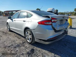 2018 Ford Fusion Hybrid S with VIN 3FA6P0UU8JR244912, listed as a IAAI auction lot 41742940 with 65,885 mi miles. Bid and sale history available at carsss.com. Image 3.