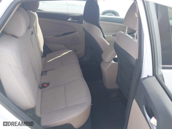 2019 Hyundai Tucson SE with VIN KM8J23A46KU048921, listed as a IAAI auction lot 40781586 with 57,186 mi miles. Bid and sale history available at carsss.com. Image 8.