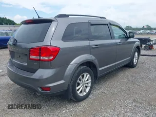 2013 Dodge Journey SXT with VIN 3C4PDCBG8DT517733, listed as a IAAI auction lot 42737063 with 67,363 mi miles and . Bid and sale history available at DreamBid. Image 4.