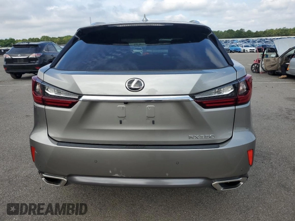 2017 Lexus RX 350 with VIN 2T2BZMCA2HC114007, listed as a Copart auction lot 63587985 with 61,421 mi miles and Salvage title. Bid and sale history available at DreamBid. Image 6.