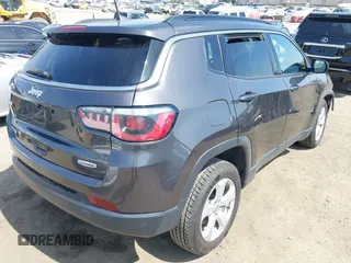 2019 Jeep Compass Latitude with VIN 3C4NJDBB8KT729491, listed as a IAAI auction lot 42489691 with 73,022 mi miles and . Bid and sale history available at DreamBid. Image 4.