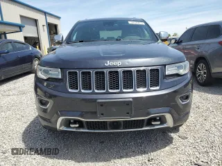 2016 Jeep Grand Cherokee Overland with VIN 1C4RJFCG9GC338165, listed as a Copart auction lot 54125815 with 102,302 mi miles and Salvage title. Bid and sale history available at DreamBid. Image 5.