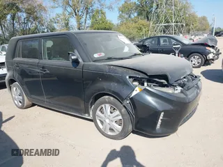 2014 Scion xB z VIN JTLZE4FE5EJ059750, wystawiony jako IAAI lot #40579685 z przebiegiem 106 302 mil mil oraz . Historia ofert i sprzedaży dostępna na DreamBid. Obrazek 1.