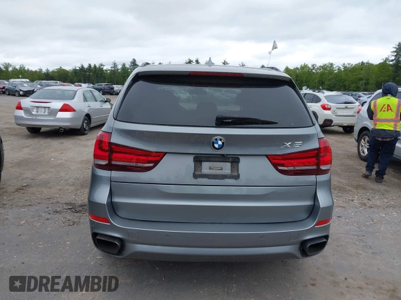2014 BMW X5 xDrive50i with VIN 5UXKR6C54E0C02423, listed as a IAAI auction lot 42278044 with 122,370 mi miles and . Bid and sale history available at DreamBid. Image 16.