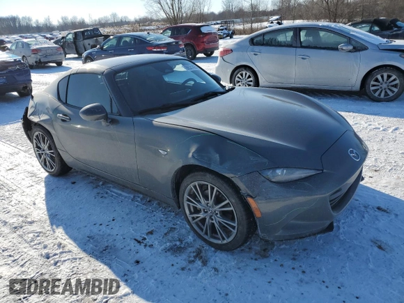 2024 Mazda MX-5 Miata Grand Touring z VIN JM1NDAM73R0607806, wystawiony jako Copart lot #88531435 z przebiegiem 3 089 mil mil oraz Szkoda całkowita • Salvage title. Historia ofert i sprzedaży dostępna na DreamBid. Obrazek 4.