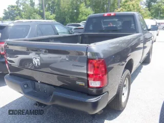 2019 Ram 1500 Tradesman z VIN 3C6JR6DGXKG502184, wystawiony jako IAAI lot #42524439 z przebiegiem 98 494 mil mil oraz . Historia ofert i sprzedaży dostępna na DreamBid. Obrazek 13.